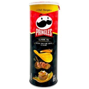 Pringles Steak And Foie Gras da 80 gr. Scopri il piacere di degustare queste  Pringles al sapore foie gras e bistecca di manzo. Sono state create dallo Chef Morgan. Perfette per chi cerca qualcosa di più del solito snack. Lasciati sorprendere dall'equilibrio tra la ricchezza del foie gras e il sapore succulento della bistecca di manzo per un’esperienza di gusto unica