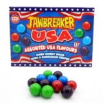Zed Candy Jawbreakers USA sono le classiche caramelle dure multistrato, famose per la loro lunga durata e i colori vivaci. Ogni jawbreaker rivela strati successivi di gusti fruttati mentre si scioglie lentamente e una gomma d'entro, offrendo un’esperienza lunga e divertente. Perfetti per chi ama le caramelle “old school” americane.